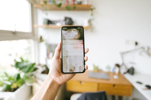 Phone with messaging concept representing WhatsApp API pricing calculation