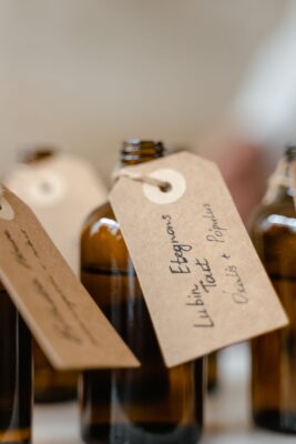 Kraft paper tags tied to bottles