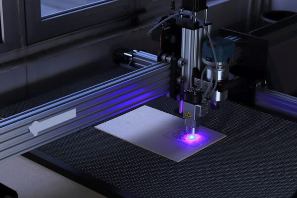 Laser head marking a sheet