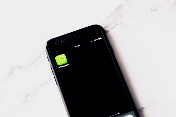 Phone with WhatsApp on a desk