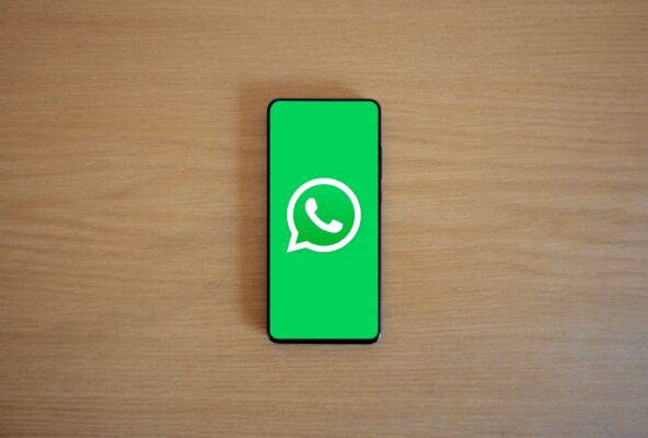 Phone showing the WhatsApp logo